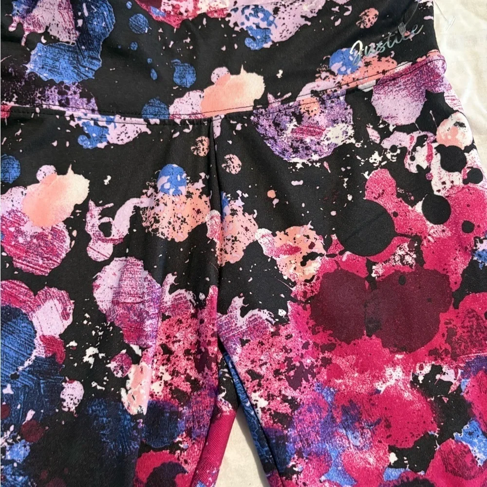 Justice Splatter Print Leggings in Pink, Purple, and Blue